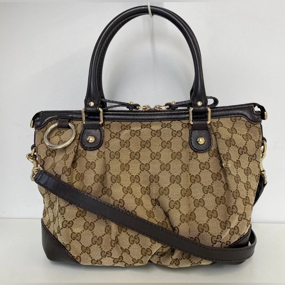 Gucci Handbags - Authentic Gucci Tote Bag GG Canvas Beige Brown Leather.